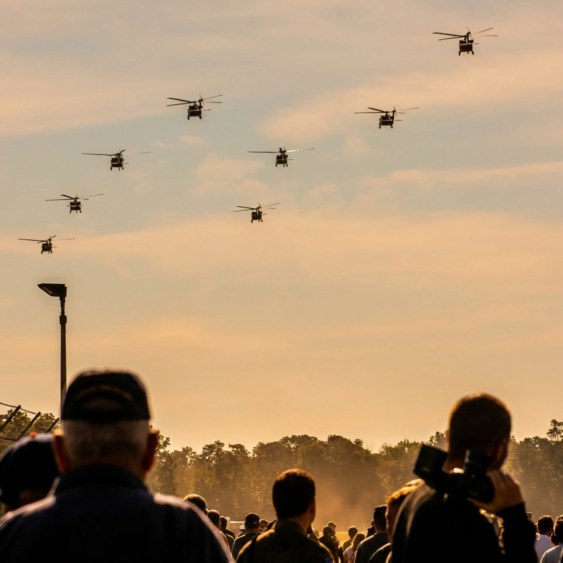 Formaci&oacute;n de helic&oacute;pteros militares al atardecer